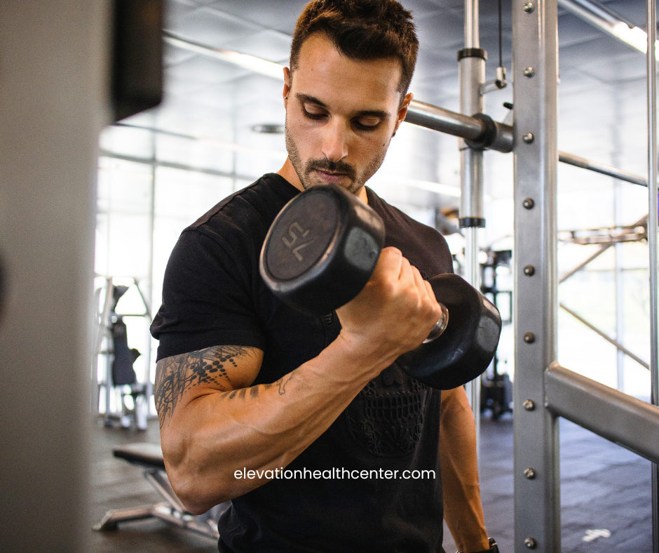 man at gym benefiting from chiropractic care for active men
