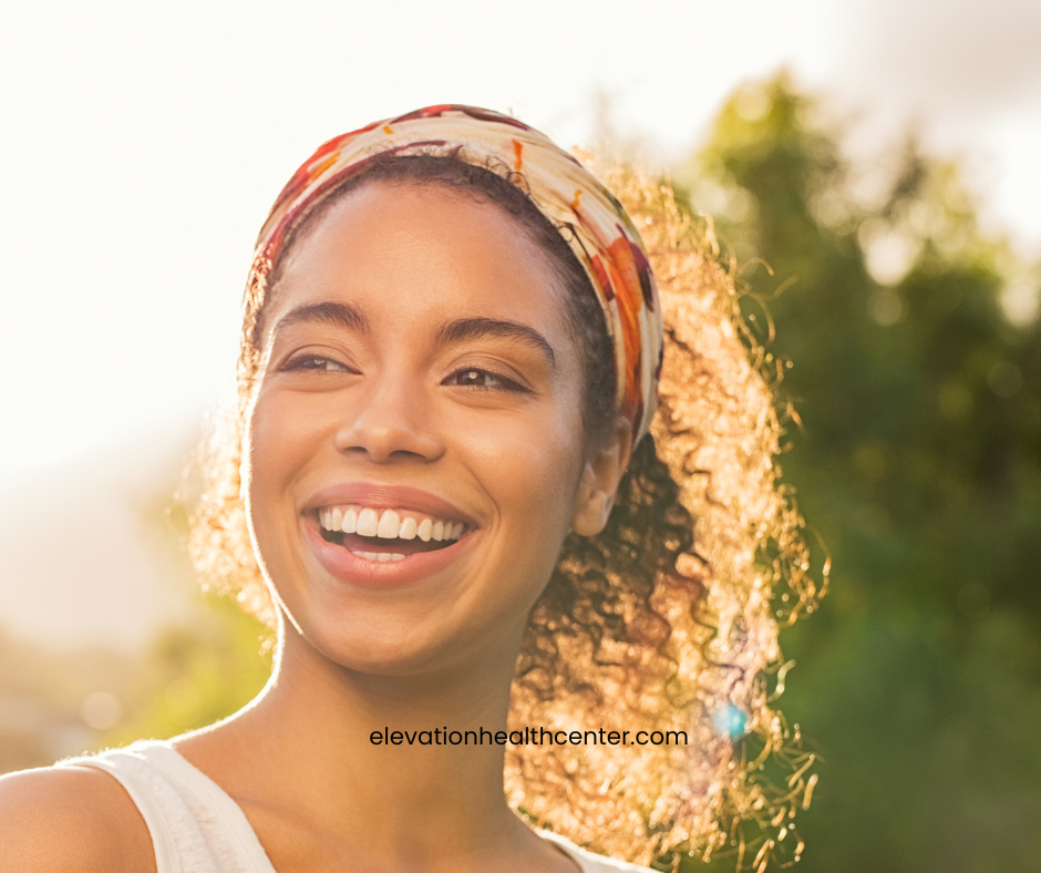 woman happy after balancing menstrual cycles