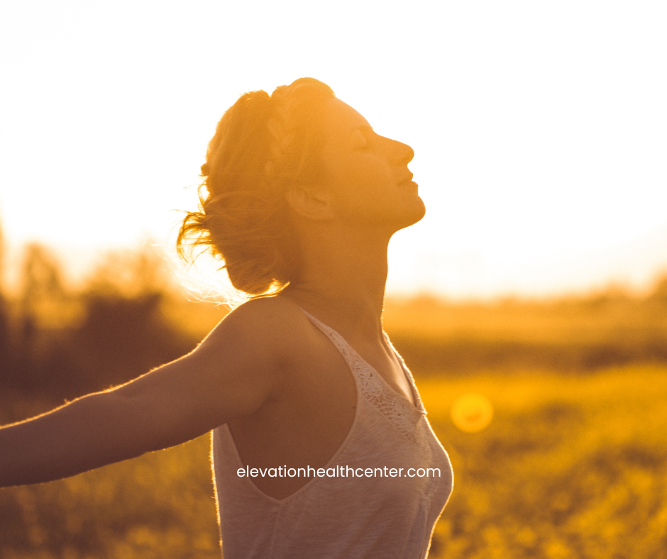 woman breathing with asthma using chiropractic care