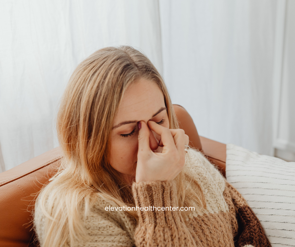 woman who needs chiropractic for sinus relief