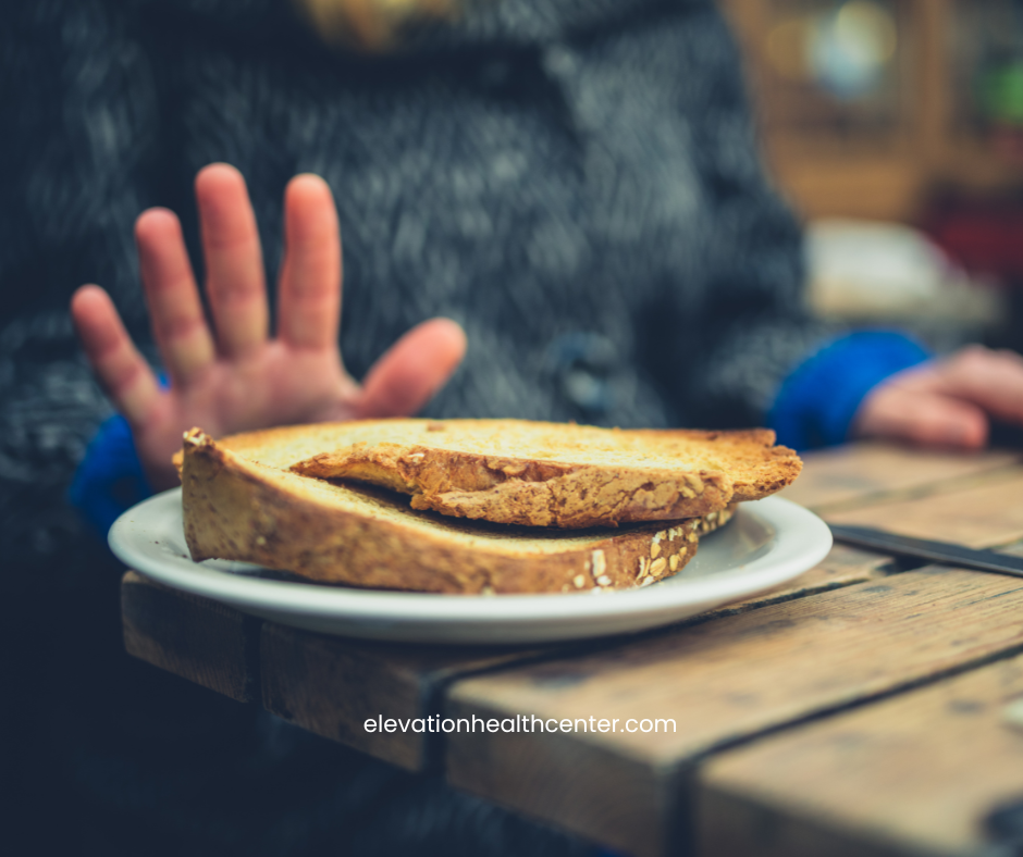 someone refusing bread due to celiac disease