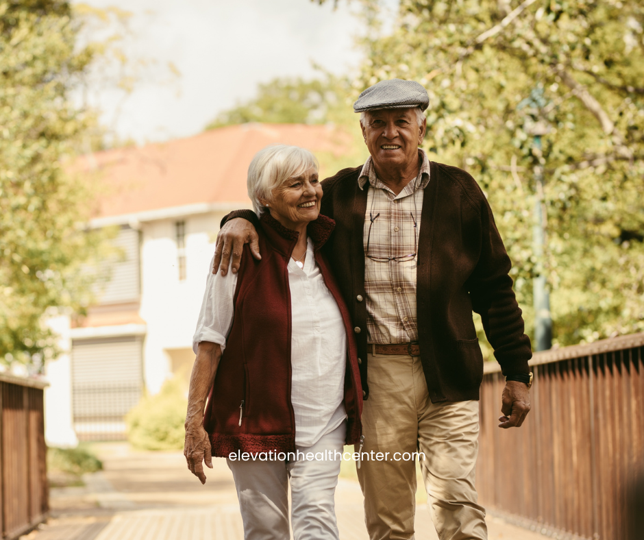 couple walking after dealing with root cause of neuropathy