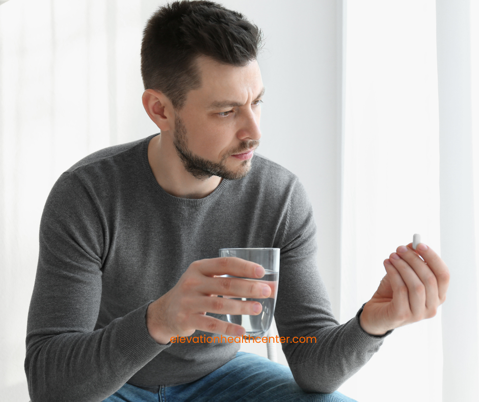 man questioning use of pain pills