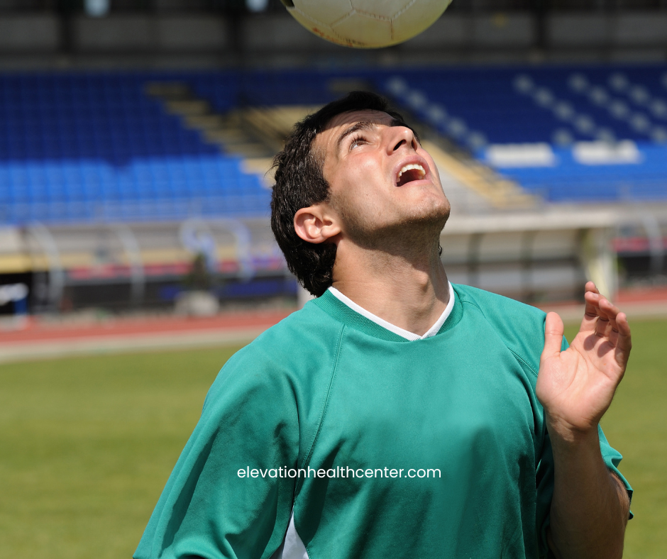 man hitting soccer ball with head - needs concussion recovery