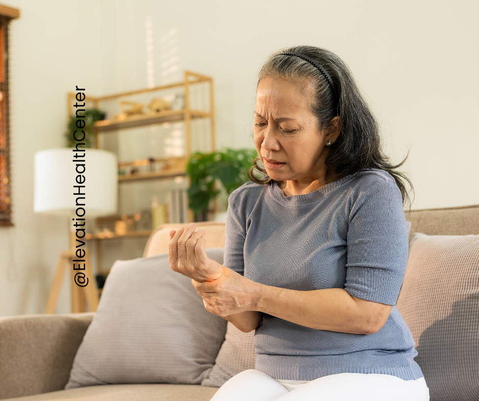 woman with pain in hand from peripheral neuropathy