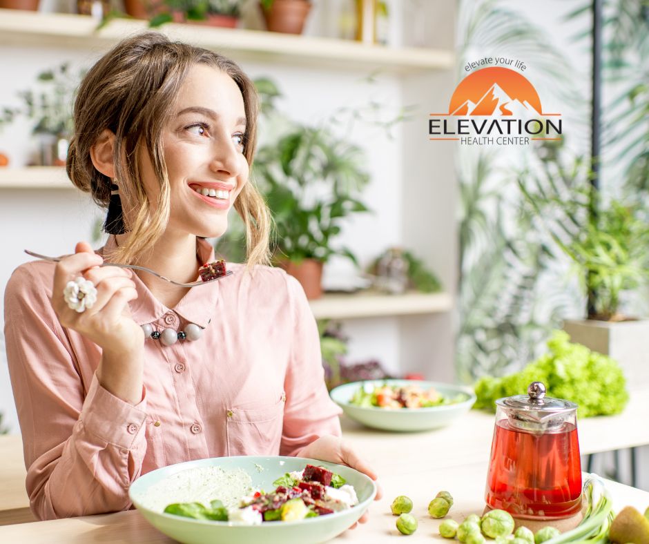 Healthy lifestyle habits: Woman enjoying a balanced breakfast with fruits and vegetables, symbolizing immune system boost